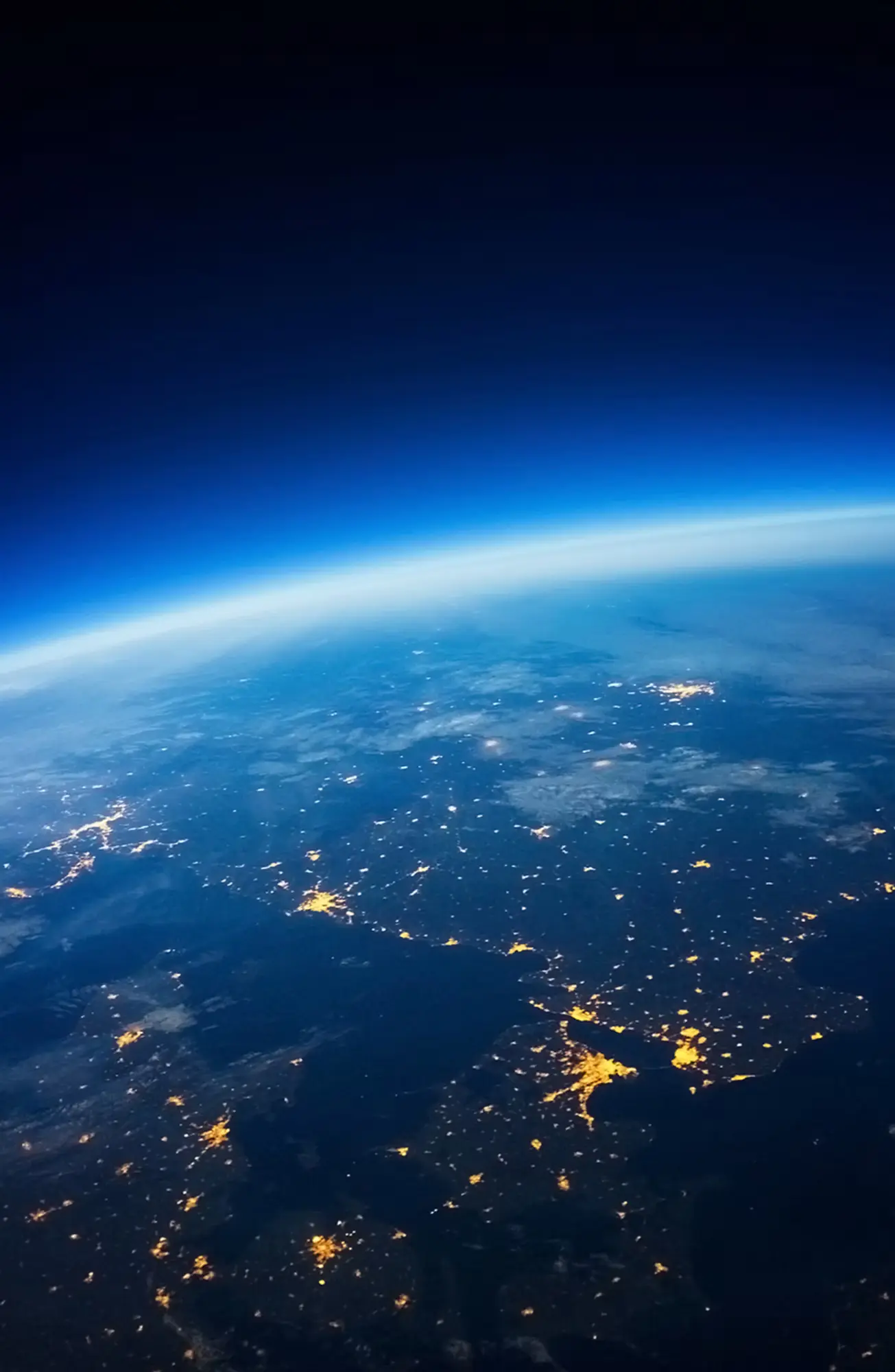 stardust therapy decorative image of the earth with city lights shining taken from space